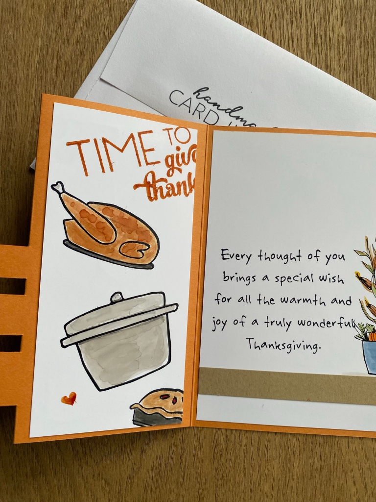 Inside of triple flag thanksgiving card. On left side, there is a cooked turkey, a cooking pot, and a pie. On the right, a cornstalk with phrase, "Every thought of you brings a special wish for all the warmth and joy of a truly wonderful Thanksgiving.
